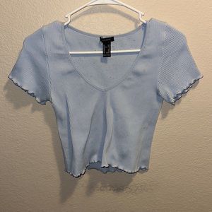 Cropped blue shirt